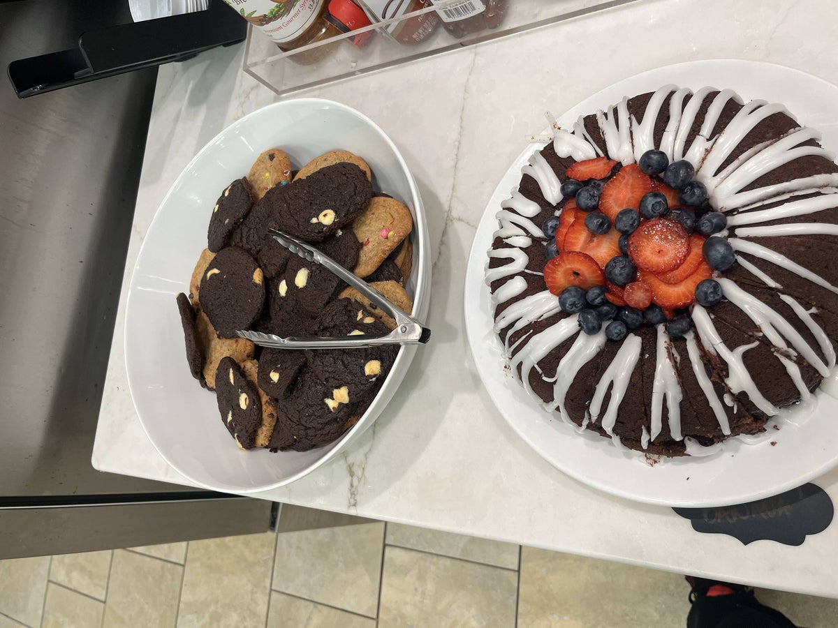B.Soulfull berry-topped chocolate cake and freshly baked cookies